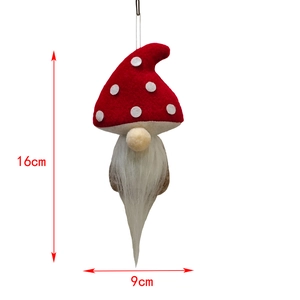 Detail of Christmas gnome ornament with 16cm height and red mushroom hat