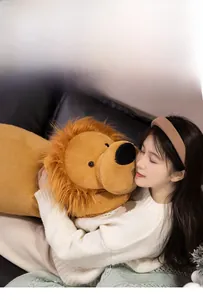 Close-up of extra-large soft lion plush toy showing fluffy mane and huggable size
