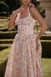 Close-up of floral print long dress showing halter neckline with delicate lace details