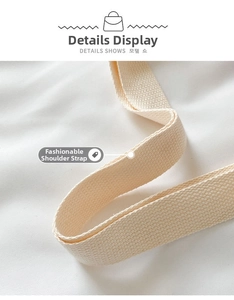 Close-up of cream-colored thick woven shoulder strap with detailed twill texture