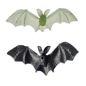 Set of green translucent and black plastic bat toys for Halloween party decorations