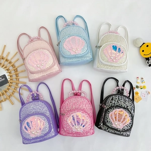 Set of colorful sequin shell backpacks with pearl handles and cute glitter patterns