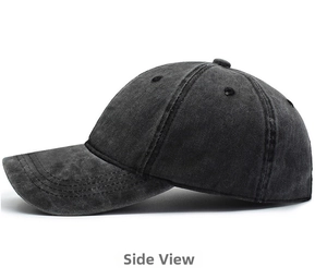 Side view of washed charcoal cotton baseball cap showing vintage texture and stitching
