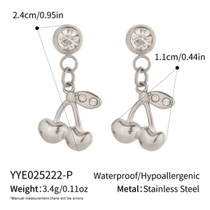 Close-up of stainless steel cherry earrings with sparkling zircon and silver leaf details