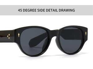 Detailed 45-degree side view of black vintage sunglasses with golden metal arrow rivets