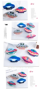 Detailed set of five colorful UFO hair claws featuring polished cartoon alien designs
