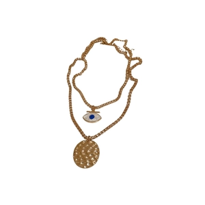 Vintage gold layered necklace with blue devil eye pendant and hammered round coin charm