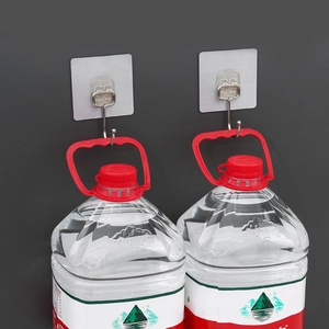 Strong transparent adhesive hooks with stainless steel holder showing heavy load capacity