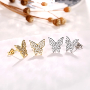 Elegant gold and silver butterfly stud earrings with micro-set cubic zirconia crystals