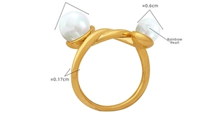 Macro shot of gold twist ring with iridescent pearls and detailed size measurements