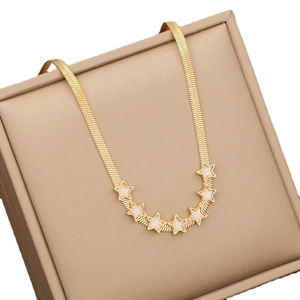 Golden blade chain necklace with seven white star pendants in a jewelry display box