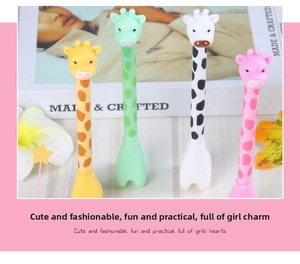 Detail of cute giraffe shaped gel pens in four colors with a self-standing base design