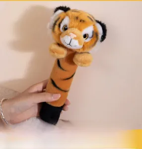 Close-up of soft tiger plush massage stick with detailed cute facial embroidery
