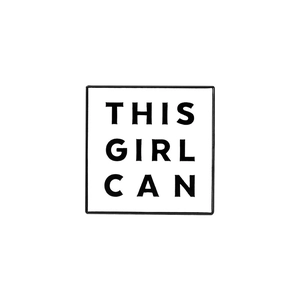 Close-up of square enamel badge with THIS GIRL CAN text on a minimalist white background