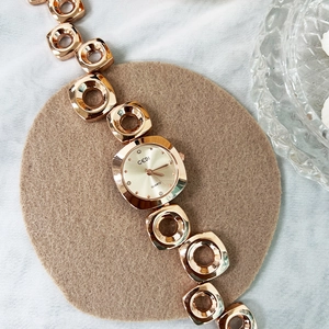 Elegant rose gold square quartz watch with a unique geometric hollowed link bracelet