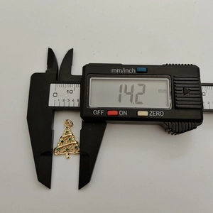 Detailed measurement showing the 14.2mm size of the gold Christmas tree charm