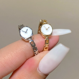 Minimalist vintage watch style rings in gold and silver with hexagon watch dial design