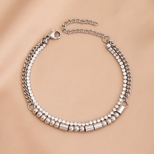 Detailed view of silver double-layer bracelet with sparkling rhinestones and metal beads