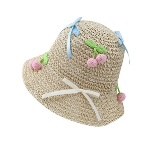 Women's woven straw sun hat with cute bows and crochet cherry ornaments for summer beach