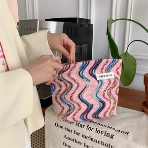 Rainbow embroidered canvas cosmetic bag with zipper and large capacity for travel