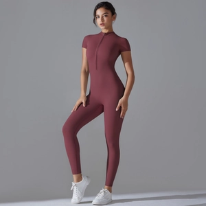 Close-up of high-elasticity fabric and zipper detail on wine red yoga bodysuit