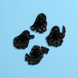 Back view of four ghost enamel pins with textured black metal and secure rubber backings