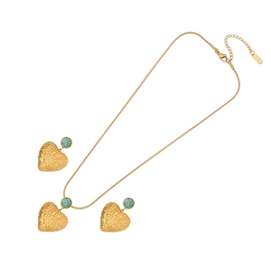 Gold geometric heart jewelry set with turquoise accents including necklace and earrings