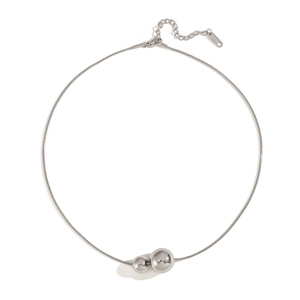 Detailed macro view of S925 sterling silver ball pendant necklace with lobster clasp
