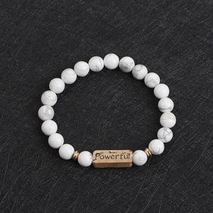Natural white turquoise stone bead bracelet with powerful engraved metal charm