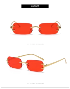 Detail view of red rimless rectangular sunglasses with gold metal temples and C02 model mark