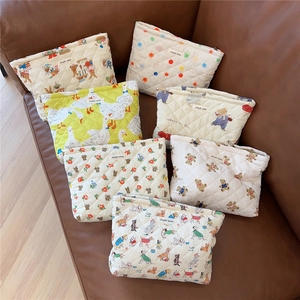 Detailed collection of quilted cotton cosmetic bags with cute animal and floral prints