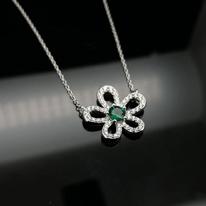 S925 silver necklace featuring a floral pendant with emerald green gem and white stones