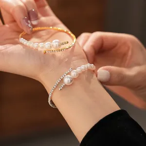 Minimalist open pearl bracelet with shimmering diamonds and elegant gold or silver finish
