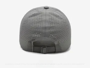 Rear view of dark grey baseball cap featuring laser-cut ventilation holes and adjustable buckle