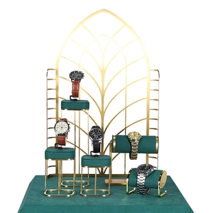 Green velvet and gold metal watch display stand set for premium jewelry showcase storage