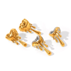 Lava heart earrings in gold and silver mix with a unique melting metal visual texture