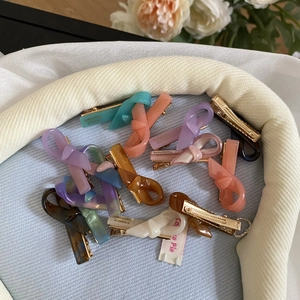 Chic acetate bow hair clips in multiple colors with French handmade engraving