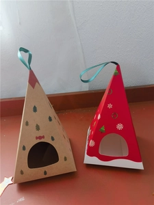 Close-up of pyramid Christmas gift boxes in red and kraft paper with cyan ribbons