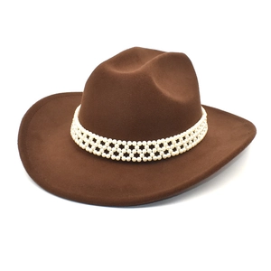 Detailed view of brown wool fedora hat featuring multi-row white pearl decorative bands