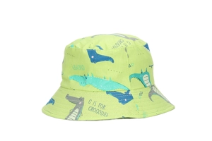 Detail of light green cotton bucket hat with cute all-over cartoon crocodile print