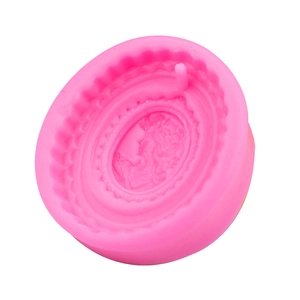 Pink silicone mold featuring an elegant lady portrait relief with floral lace borders