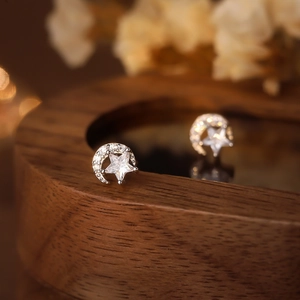 Elegant S925 sterling silver moon and star stud earrings with sparkling cubic zirconia