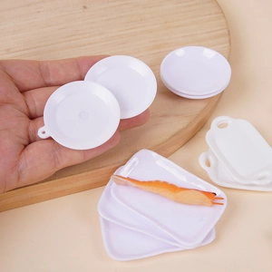 Miniature white resin kitchen plates set for dollhouse with hand for scale