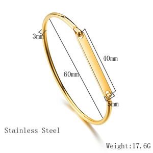 Macro shot of gold stainless steel bangle with detailed dimensions and 17.6g weight