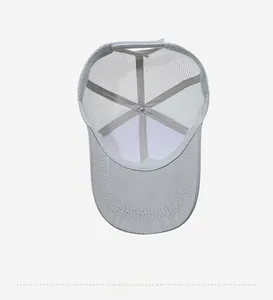 Detailed view of the internal mesh lining and hexagonal support of the baseball cap