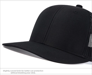 Detail of a black trucker hat with slightly curved brim for sun protection without blocking vision