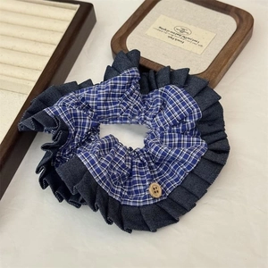 Blue plaid scrunchie with denim ruffle and wood button, stylish hair tie for ponytails