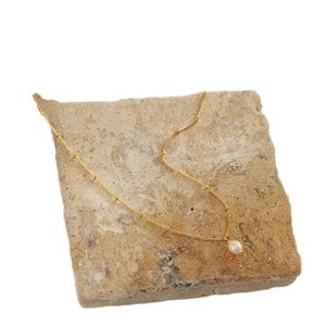 Elegant 18K gold-plated stainless steel chain necklace with small beads and a pearl pendant