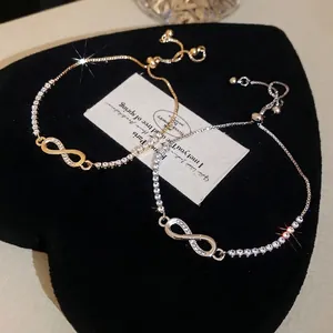 Elegant infinity zircon bracelets in gold and silver finish with adjustable slider clasp