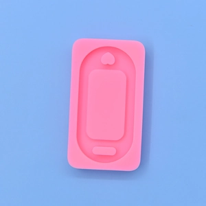 Pink silicone mold with oval tag and heart detail for DIY cake fondant and chocolate
